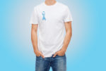 man in t-shirt with blue prostate cancer awareness ribbon