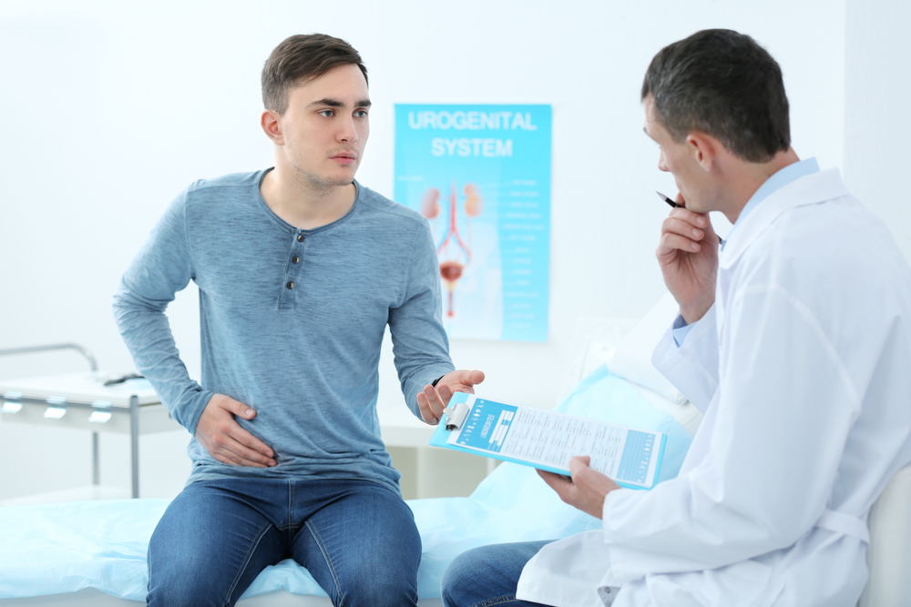 urologist and patient talking during urology appointment